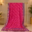 Pink Bandhani Saree with Paisley Motifs and Golden Embroidered Border