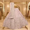 Women's Pink Lehenga Choli with Silver Embroidery and Matching Net Dupatta