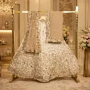 Ivory Embroidered Lehenga Choli with Beige Net Dupatta