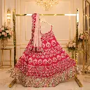 Women's Rani Pink Bridal Lehenga Choli with Gold Embroidery and Peach Net Dupatta