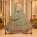 Women's Sage Green Embroidered Lehenga Choli with Sequins and Matching Net Dupatta for Wedding Wear