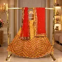 Women's Yellow Lehenga Choli with Chevron Embroidery and Orange Net Dupatta