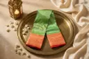 Green Kanchipuram Silk Saree with Contrast Red Zari Border