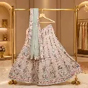Women's Peach Lehenga Choli with Floral Embroidery and Mint Net Dupatta