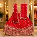Women's Red Bridal Lehenga Choli with Gold Embroidery and Net Dupatta