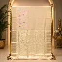 Elegant Champagne Gold Saree with Pastel Bird Motifs and Ornate Woven Pallu