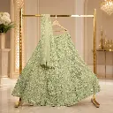 Women's Pistachio Green Lehenga Choli with Floral Sequin Work and Matching Dupatta