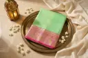 Mint Green Silk Saree with Rani Pink Zari Border