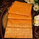Luxury Mustard Orange Banarasi Silk Saree with Elephant Zari Border & Paisley Weaving