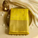 Radiant Yellow Banarasi Silk Saree with Contrast Bandhani Blouse