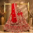 Women's Red Bridal Lehenga Choli with Heavy Gold Embroidery and Net Dupatta