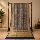 Navy Blue Traditional Motif Saree with Gold-Tone Floral Border and Decorative Pallu