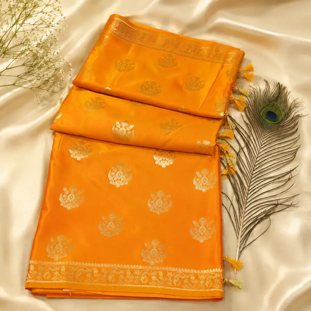 Orange Silk Saree with Silver Zari Motifs, Tassel Edge & Woven Border