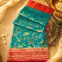 Elegant Turquoise Banarasi Silk Saree with Floral Zari Weave & Pink Contrast Border