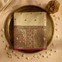 Elegant Beige Organza Saree with Intricate Floral Embroidery