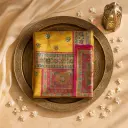 Mustard Yellow Silk Saree with Traditional Elephant and Peacock Motifs 