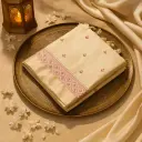 Elegant Cream Saree with Pink Embroidered Border and Tassels 