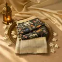 Elegant Black Ikat Elephant Motif Saree with Silver Zari Border