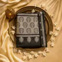 Elegant Black Silk Saree with Intricate Floral Zari Work