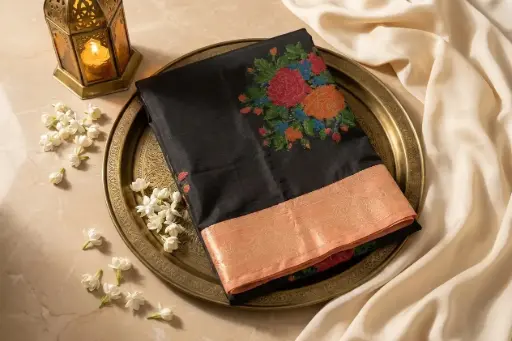 [74209001FP98E0] Black Silk Saree with Peach Zari Border and Floral Motifs